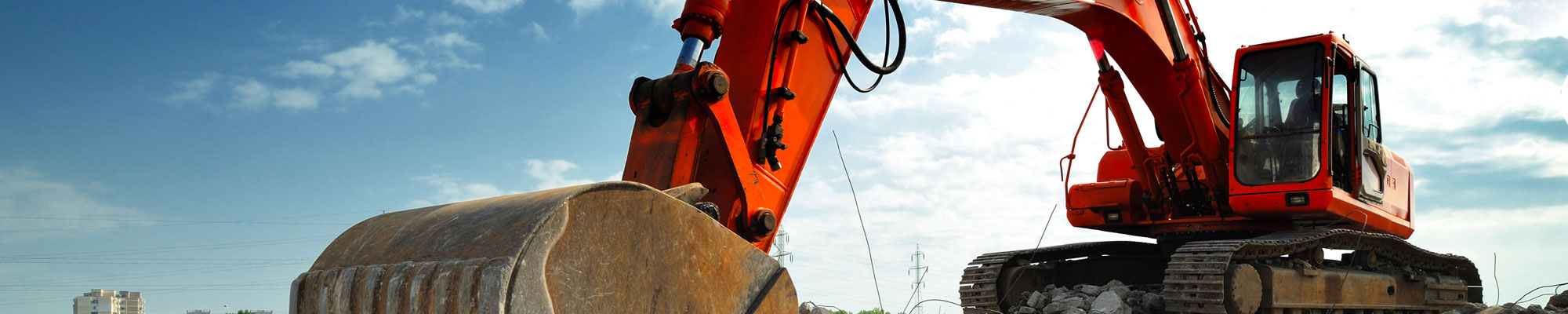 Digger on construction site in North Wales